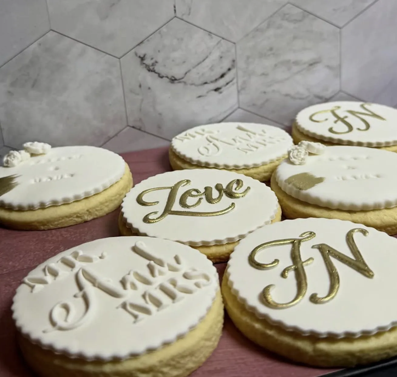 White and gold personalised cookies